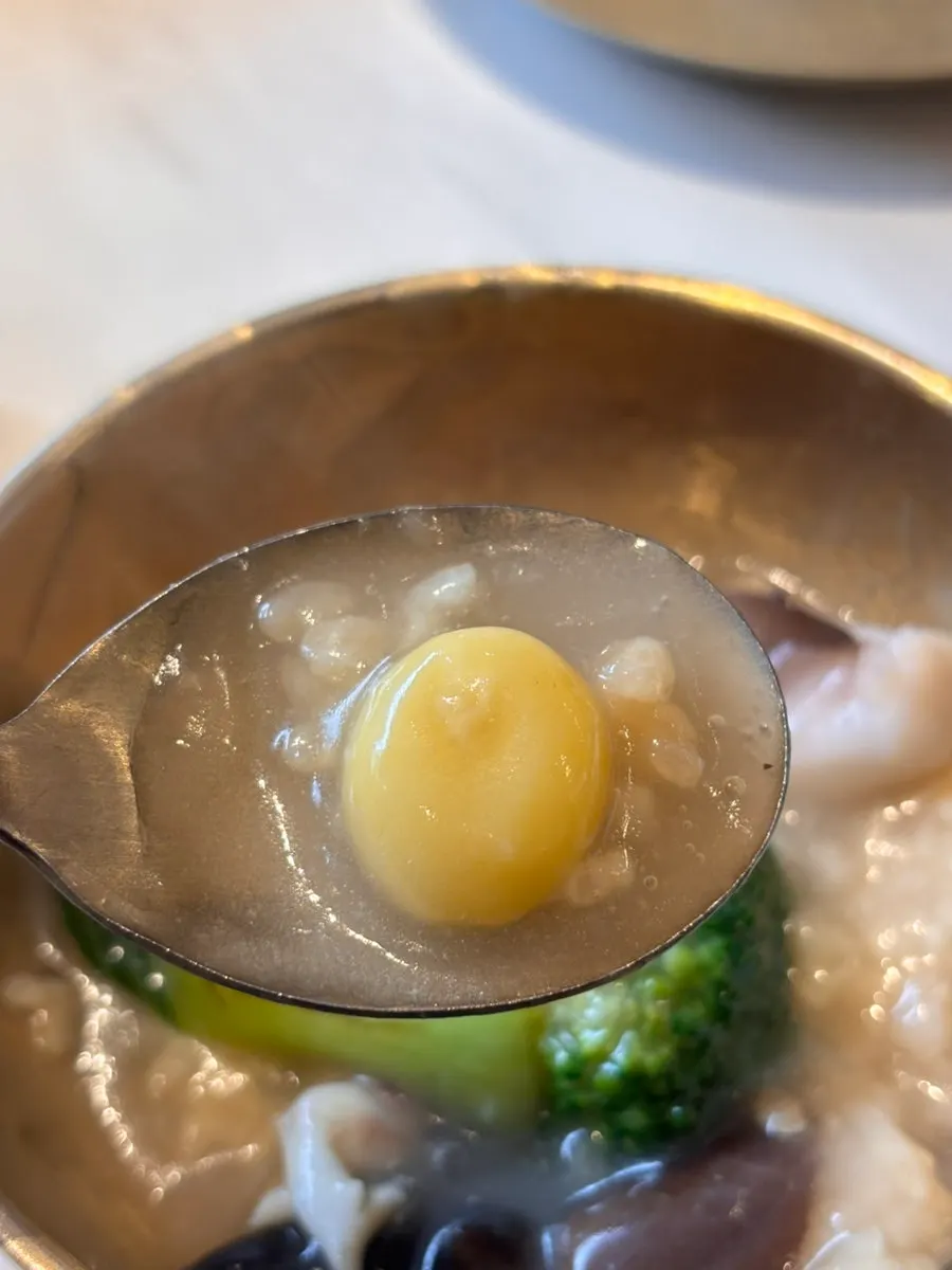 A spoonful of nurungjitang broth