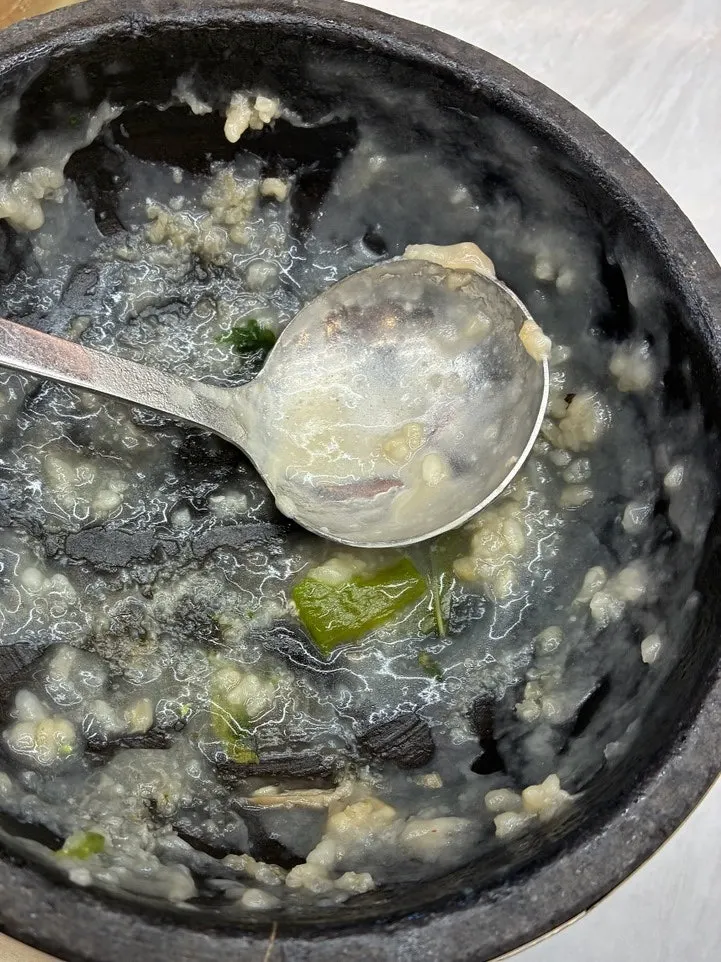 完食した海鮮アワビおこげスープの石鍋
