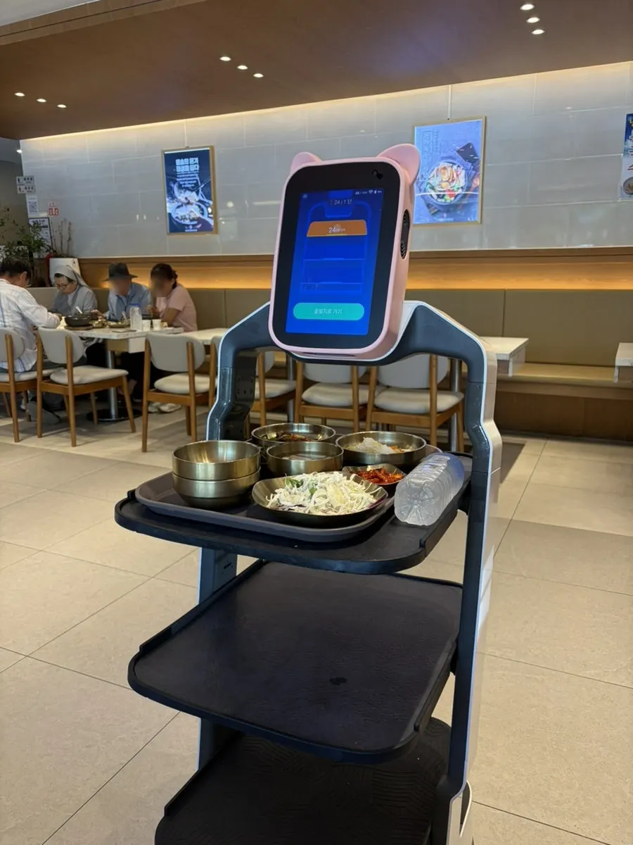 Spacious, comfortable dining room and kiosk ordering counter
