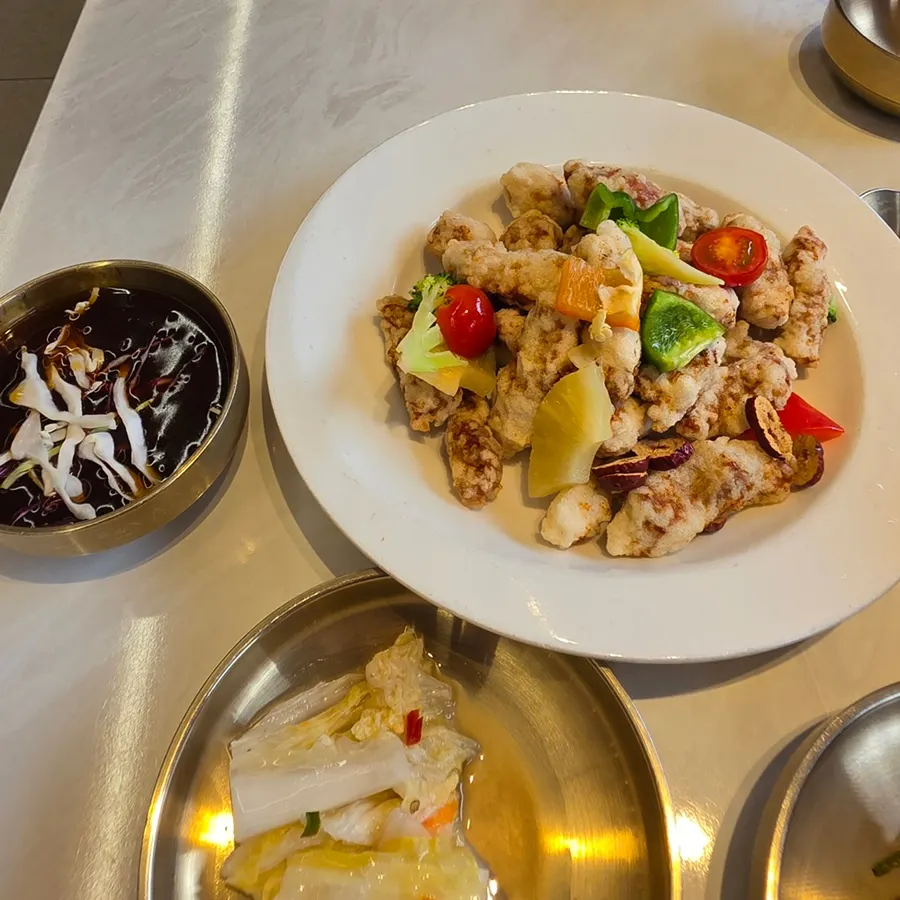 A plate of tenderloin sticky rice tangsuyuk