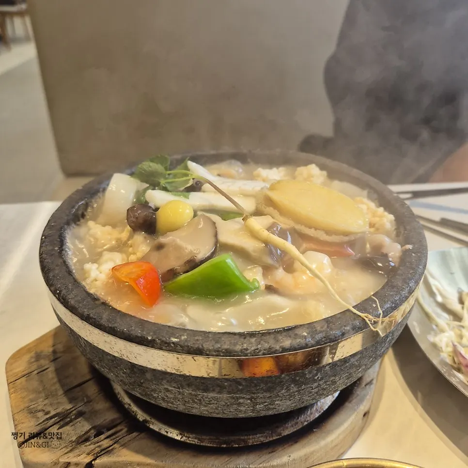 Ingredients for the seafood abalone rice soup served in a stone pot