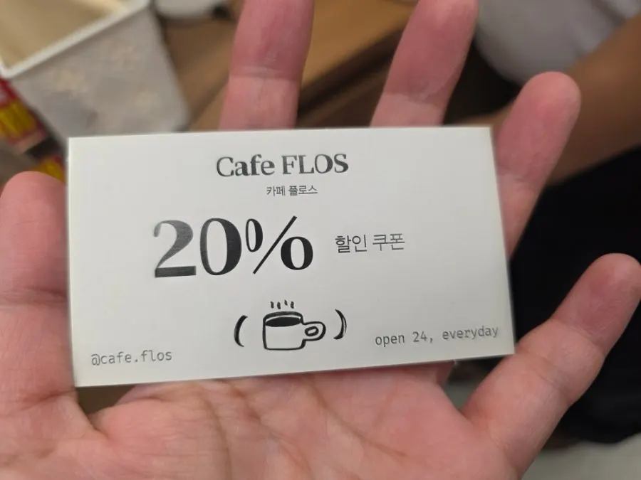 Sign explaining the café discount coupon given after a meal