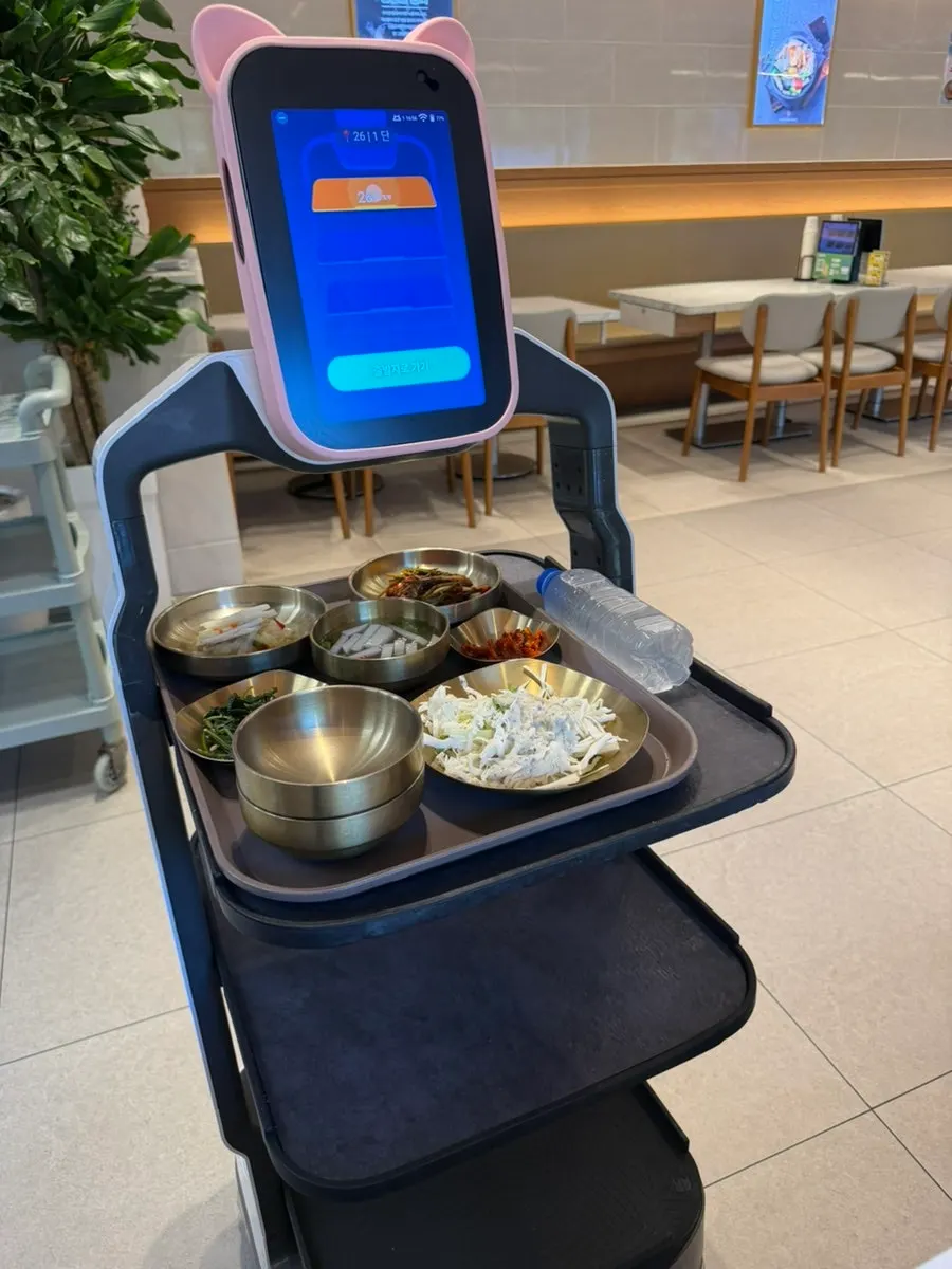 A plate of side dishes brought from the self-serve bar