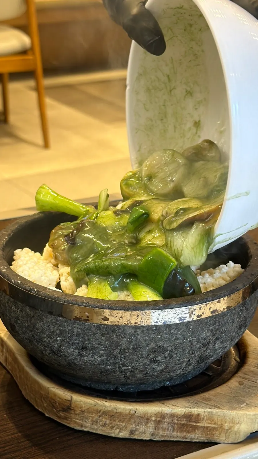 Nurungjitang bubbling away in the stone pot