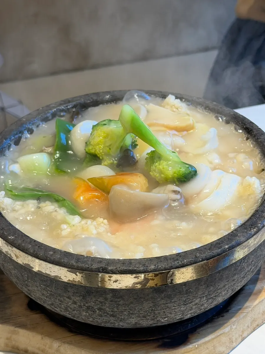 Individual stone pot of seafood nurungjitang