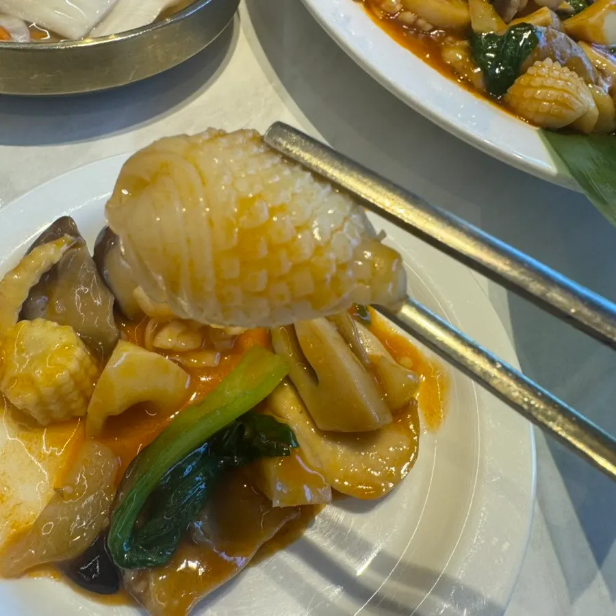 A plate of palbochae decorated with pineapple