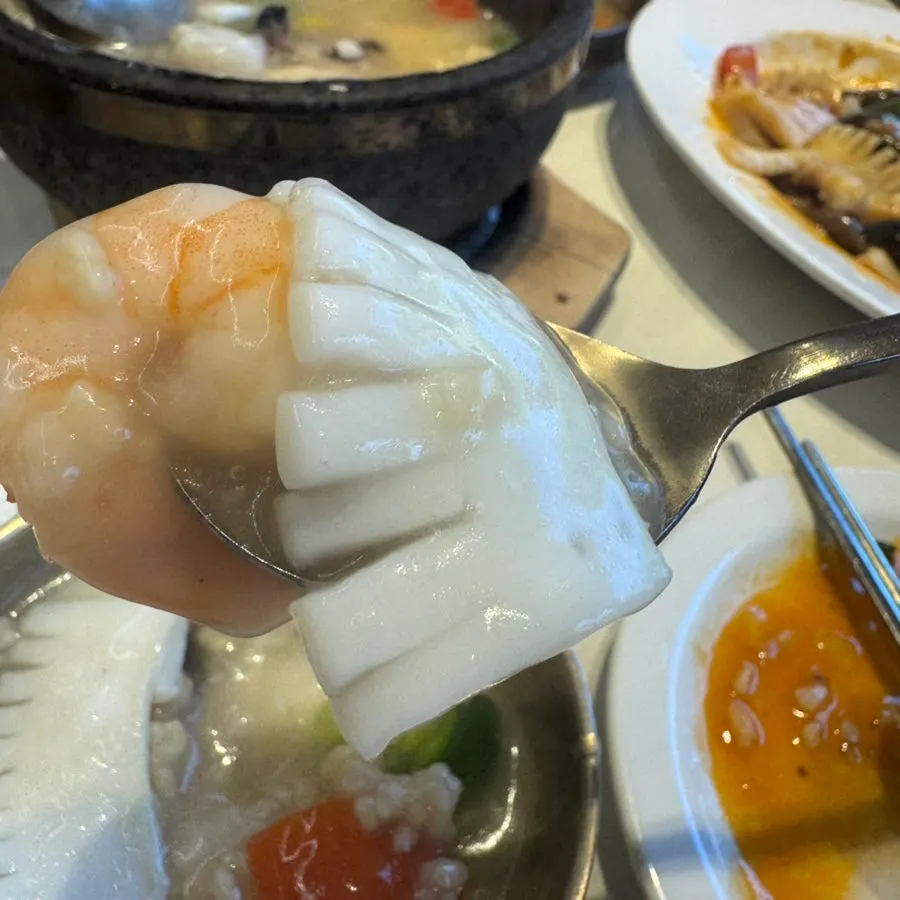 Seafood nurungjitang scooped into a small bowl