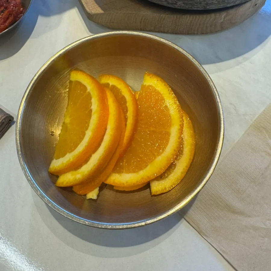 Dessert oranges set out at the self-serve corner