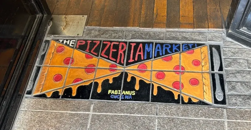 Entrance decorated with pizza tiles