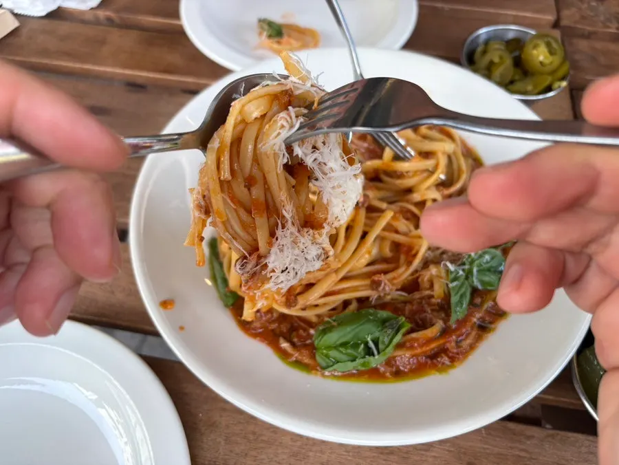 House-made ragu tomato pasta served with linguine noodles