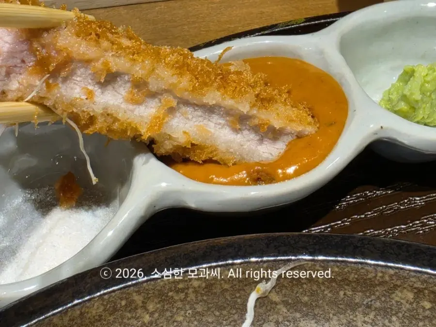 Freshly fried, thick pork loin tonkatsu