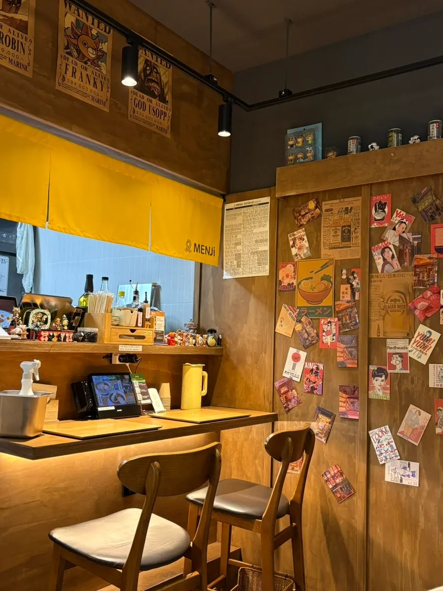 Wall covered with Japanese anime posters