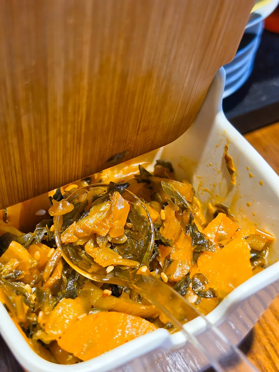Bowl of Japanese-style pickled mustard greens, takanazuke