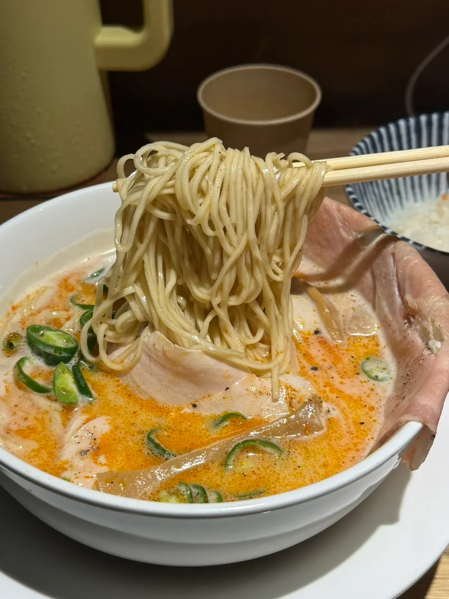 Digging into the tori paitan ramen