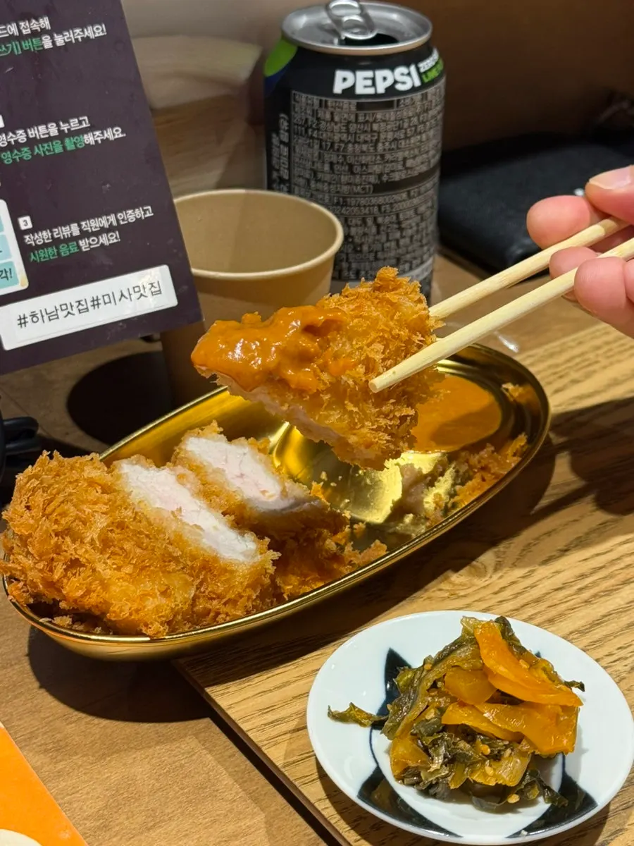 Mini tonkatsu dipped in sauce