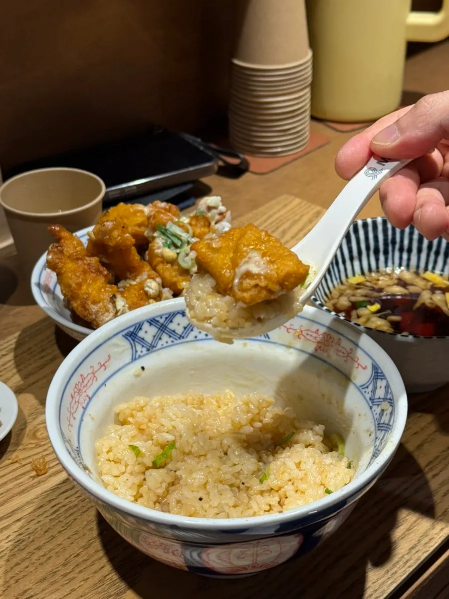 Full spread of ramen, rice bowl, and tonkatsu ordered by two
