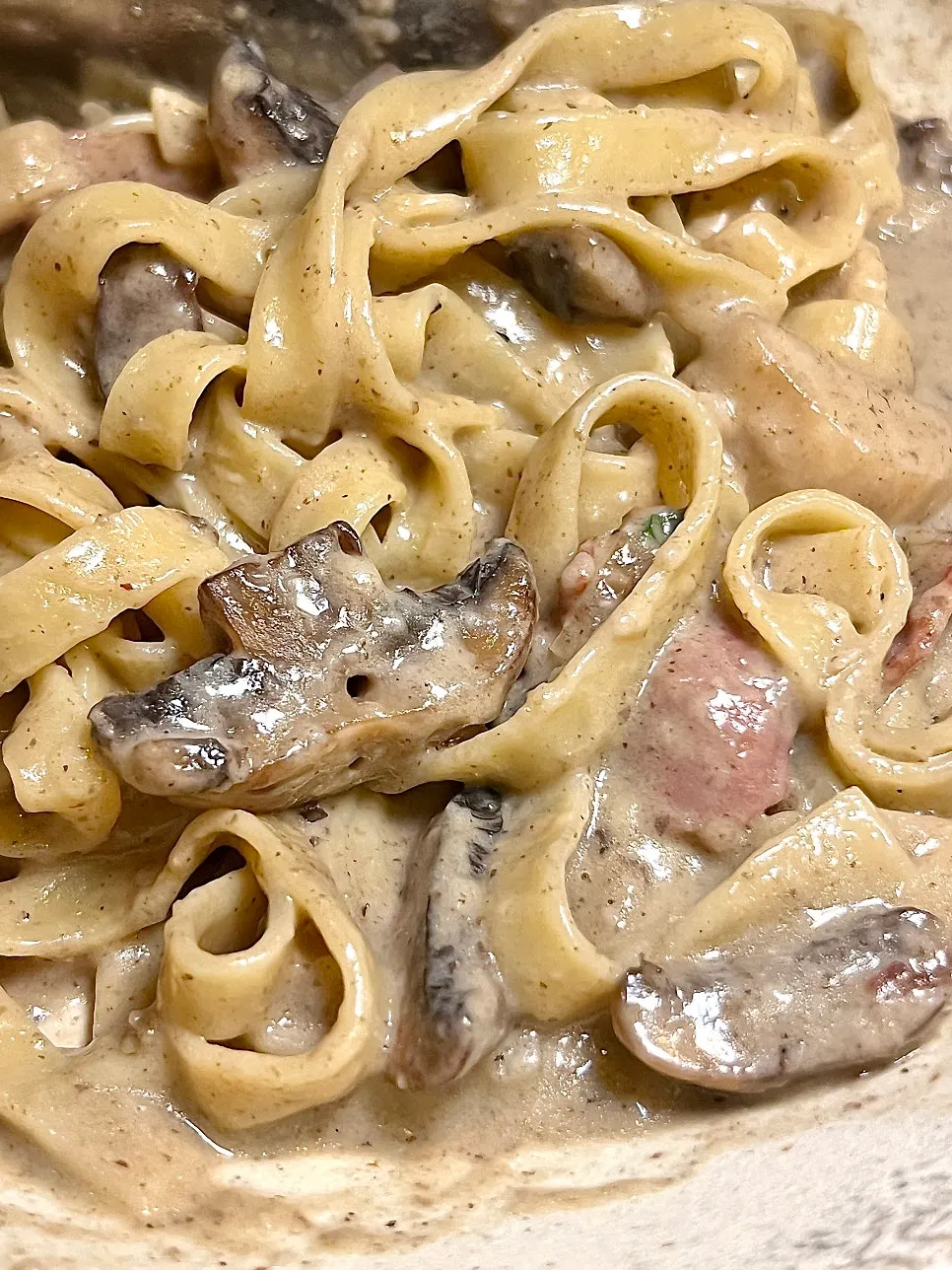Close-up of pappardelle coated in sauce