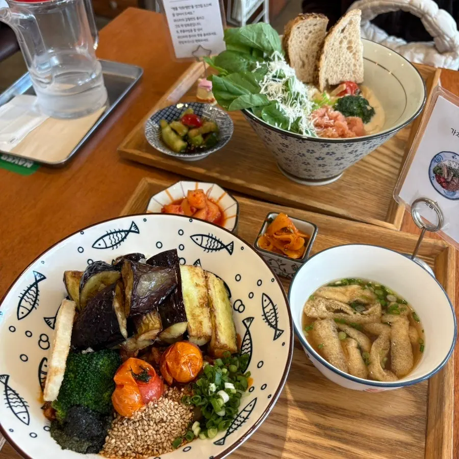 Two beautifully plated Roi Sikdang dishes