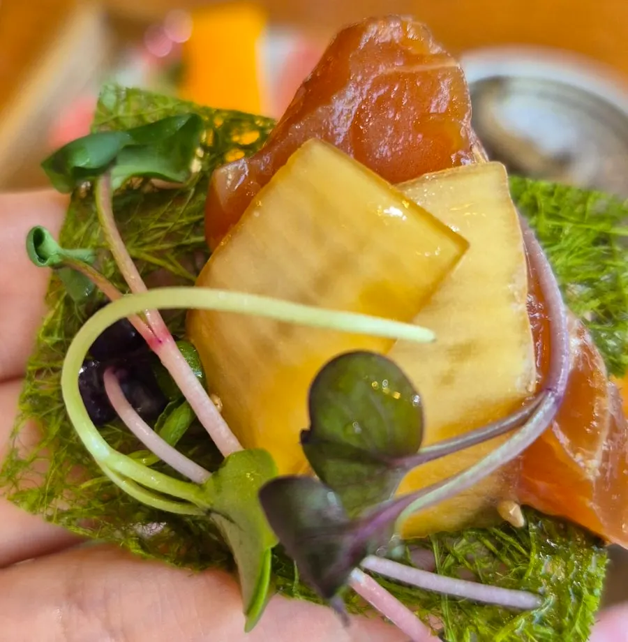 Yuzu salmon jang served with a side of wasabi