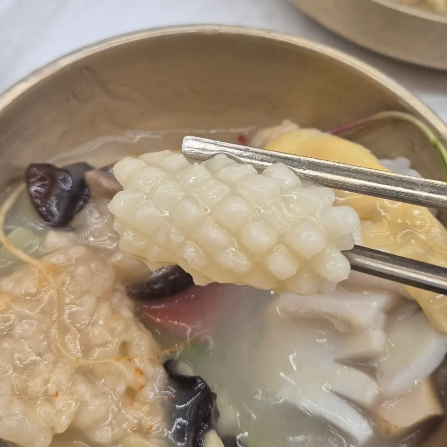 Squid, shrimp, and abalone ingredients in the nurungjitang