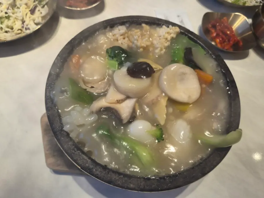Seafood nurungjitang served in a stone pot