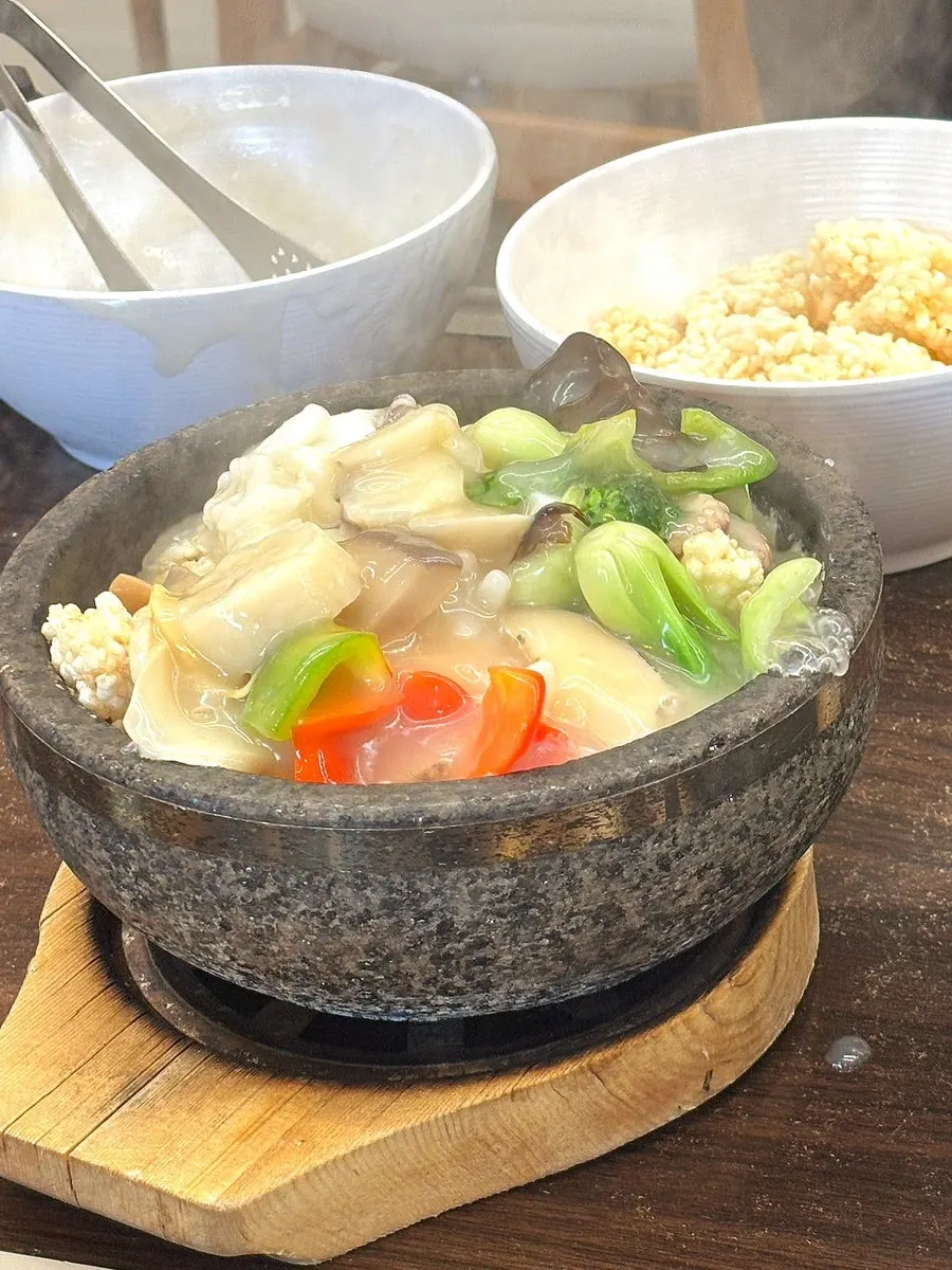Seafood nurungjitang served in an earthenware pot