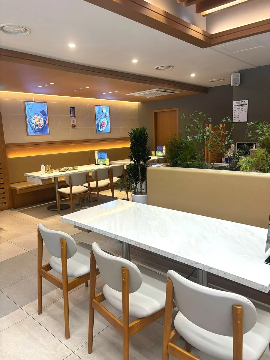 Table set with seafood nurungjitang and tangsuyuk together