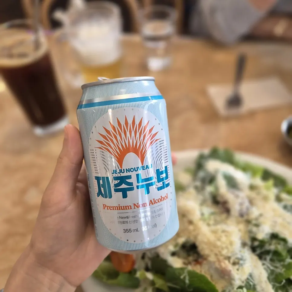 Jeju Nouveau non-alcoholic beer and an iced Americano