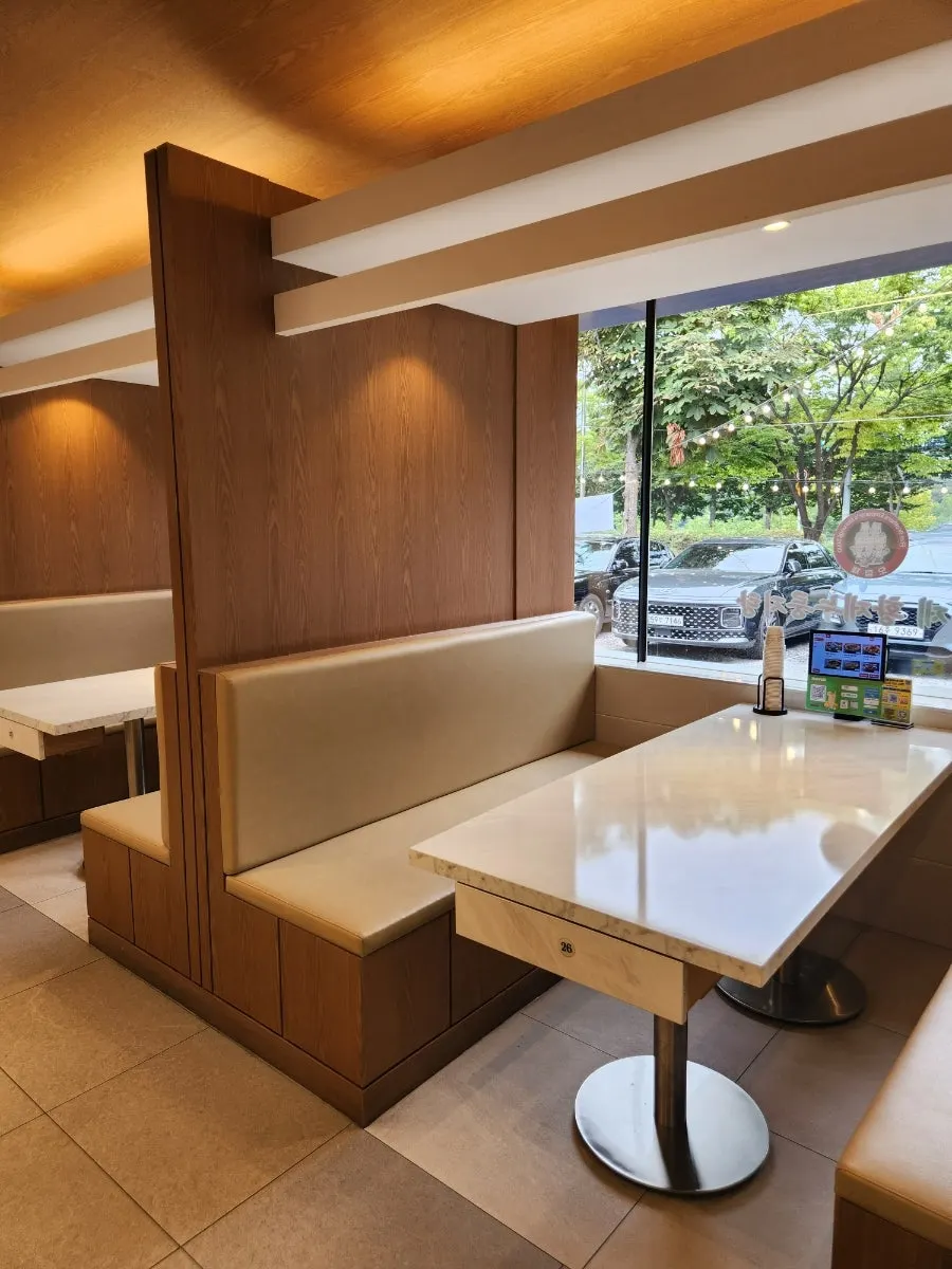 Spacious hall with generously spaced tables