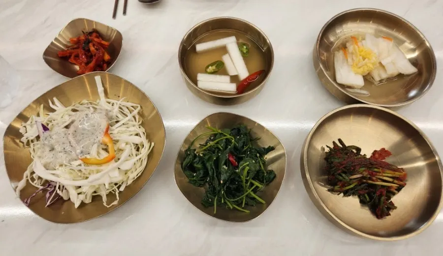 Table set with the first round of side dishes