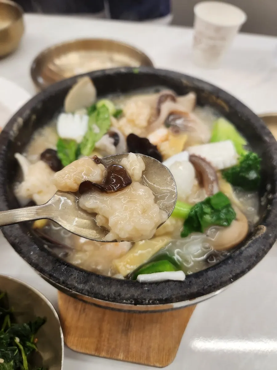Picking up a piece of abalone