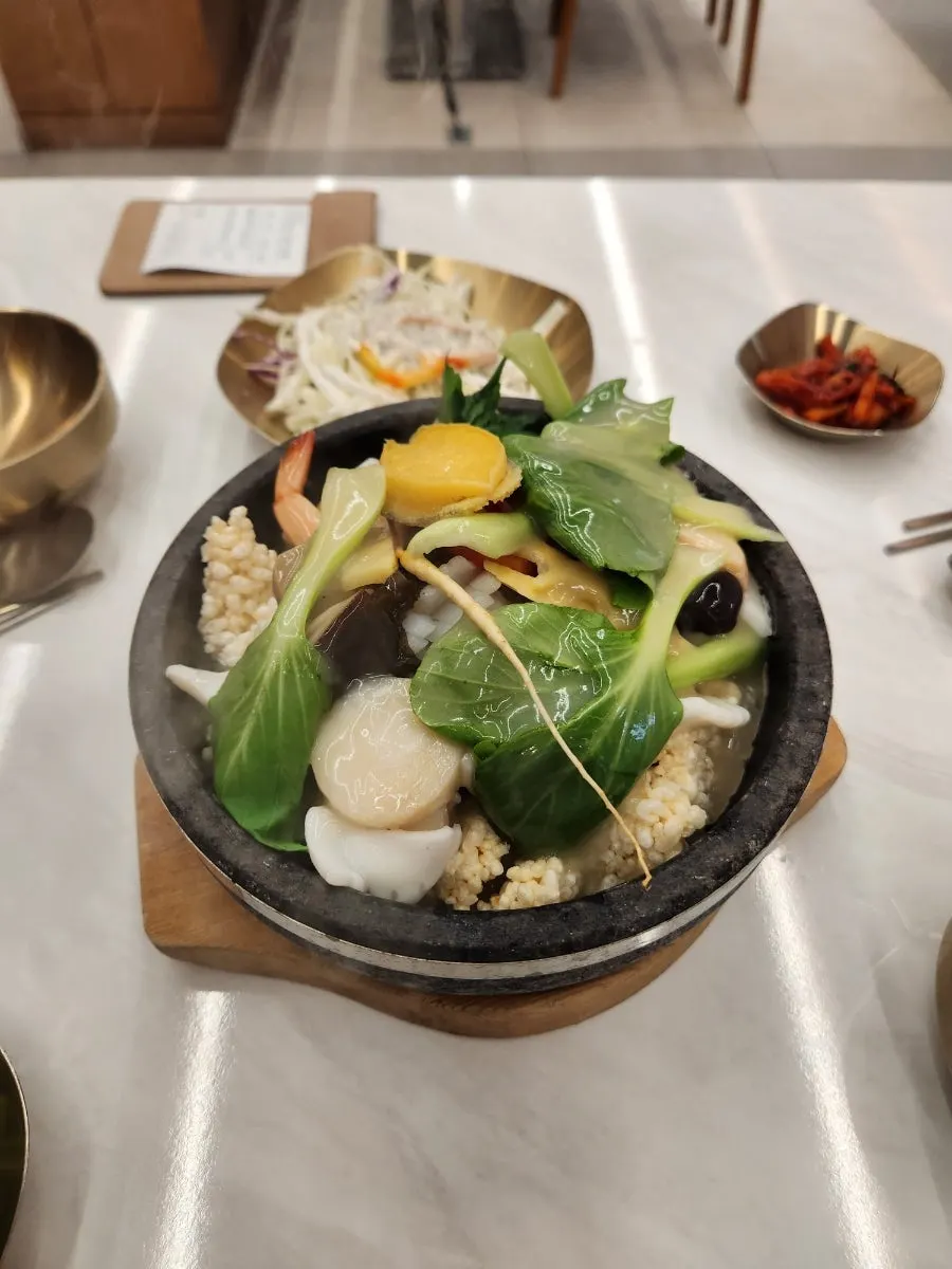 Scorched rice softened after soaking up the broth