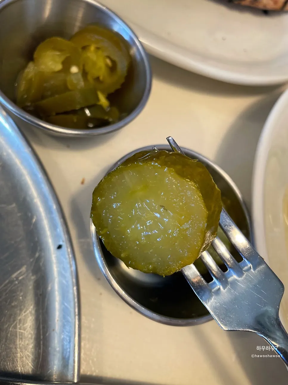 A plate of crunchy self-serve pickles