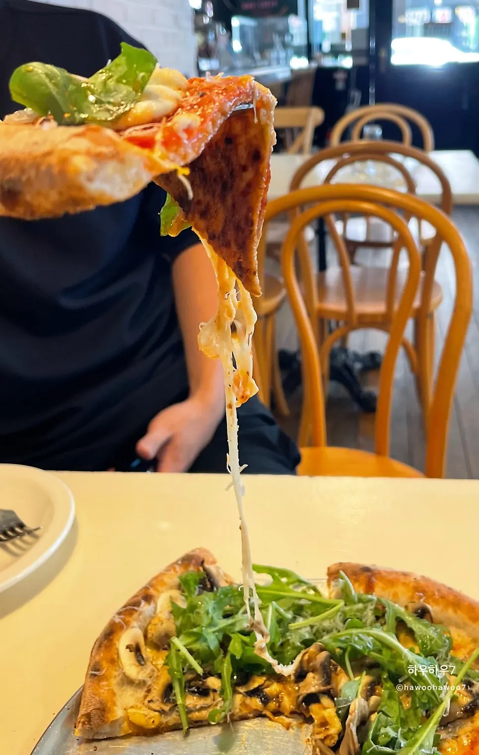 A slice of ricotta honey pepperoni pizza