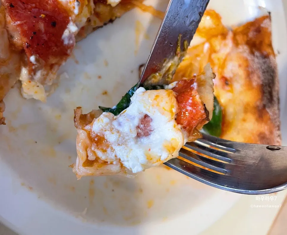 Crispy, smoky wood-fired pizza crust edge