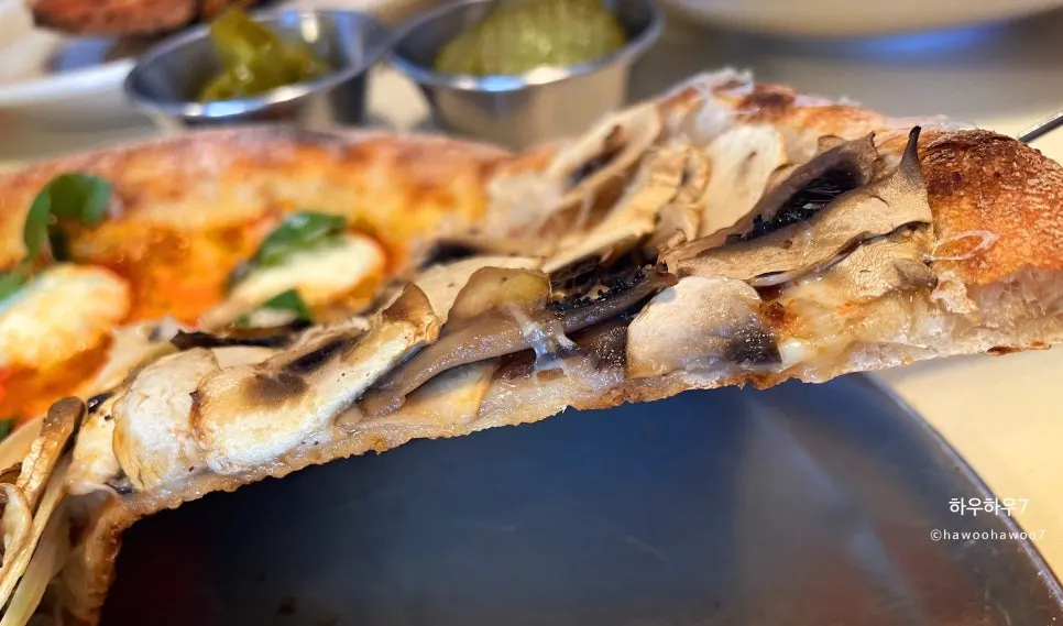 Surface of the truffle mushroom wood-fired pizza