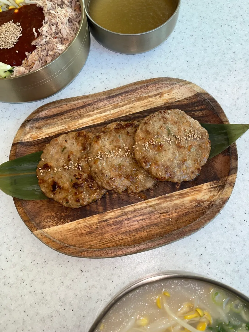 Three golden-grilled handmade pork tteokgalbi patties