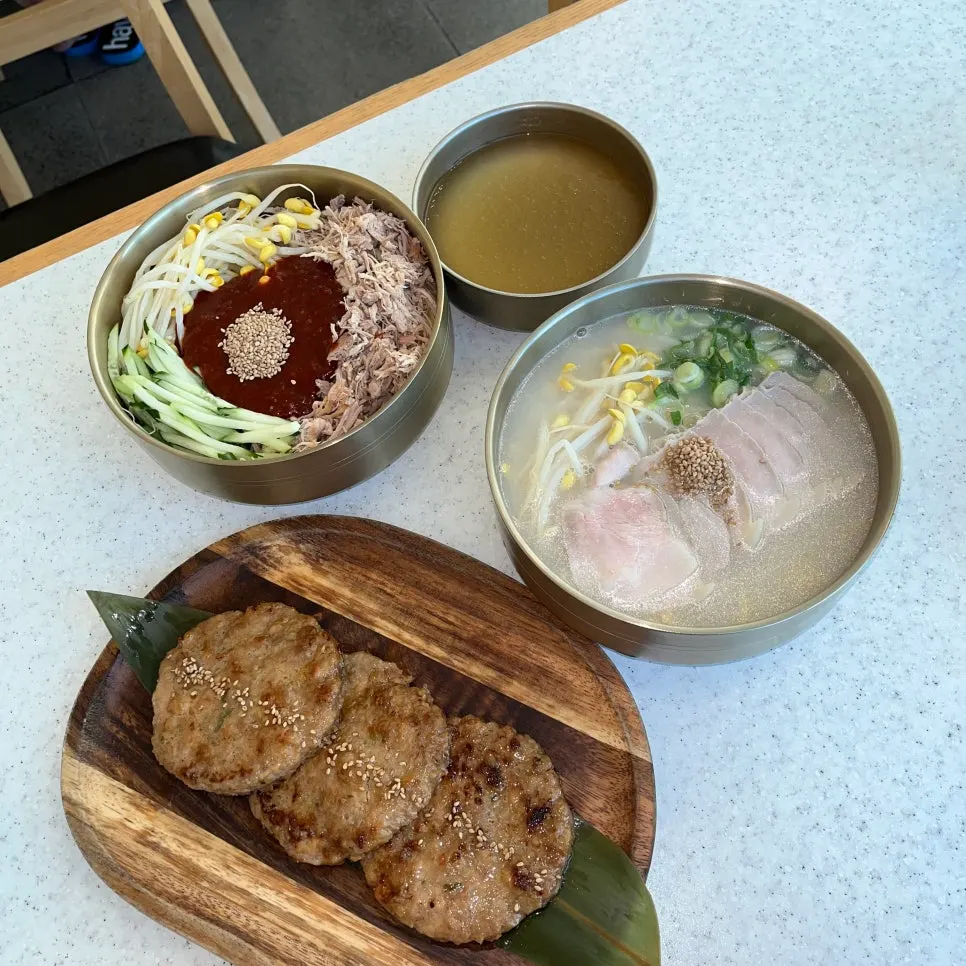 Spread of noodles and a side dish totaling ₩35,000 for two