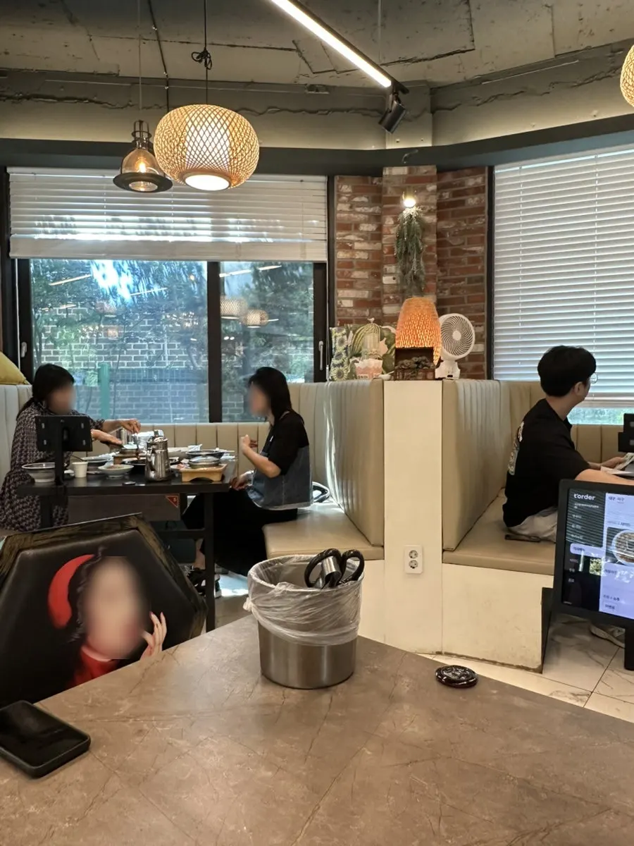 Dining hall with large tables inside the restaurant