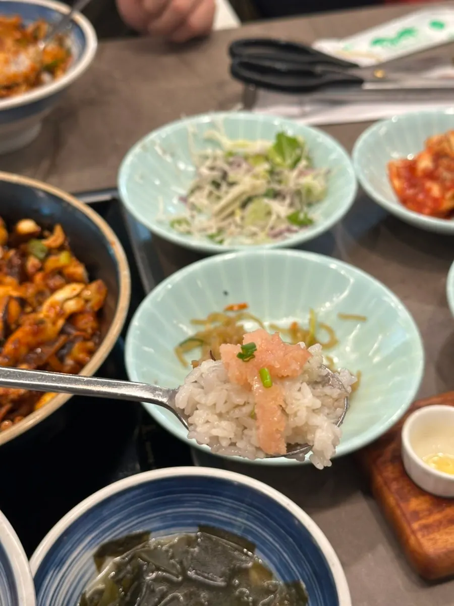 Hotpot rice mixed with jjukkumi and perilla oil
