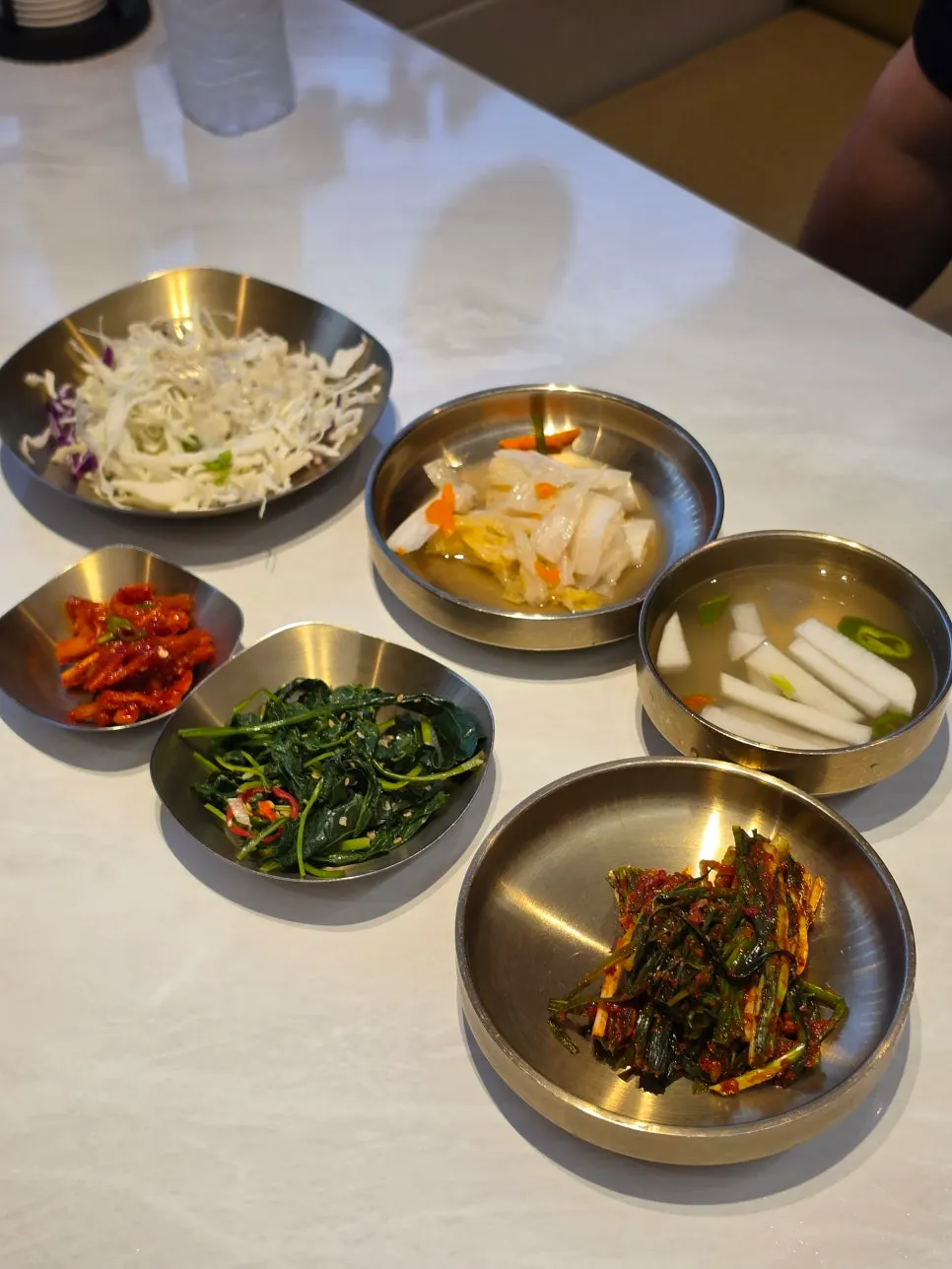 A bowl of seafood nurungjitang good for sharing with a kid