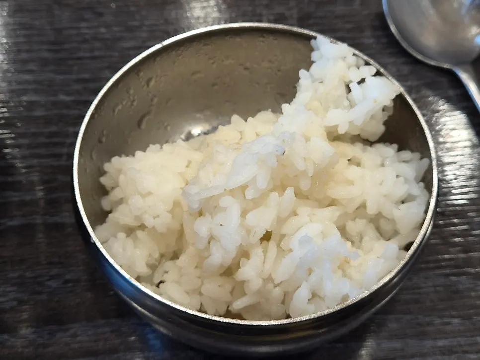 Bowl of seolleongtang with the added rice mixed in