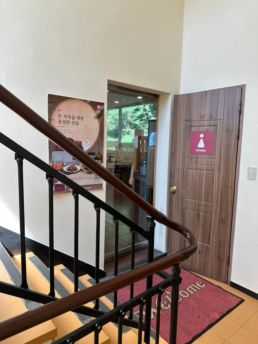 Stairwell entrance leading up to the 2nd-floor restaurant