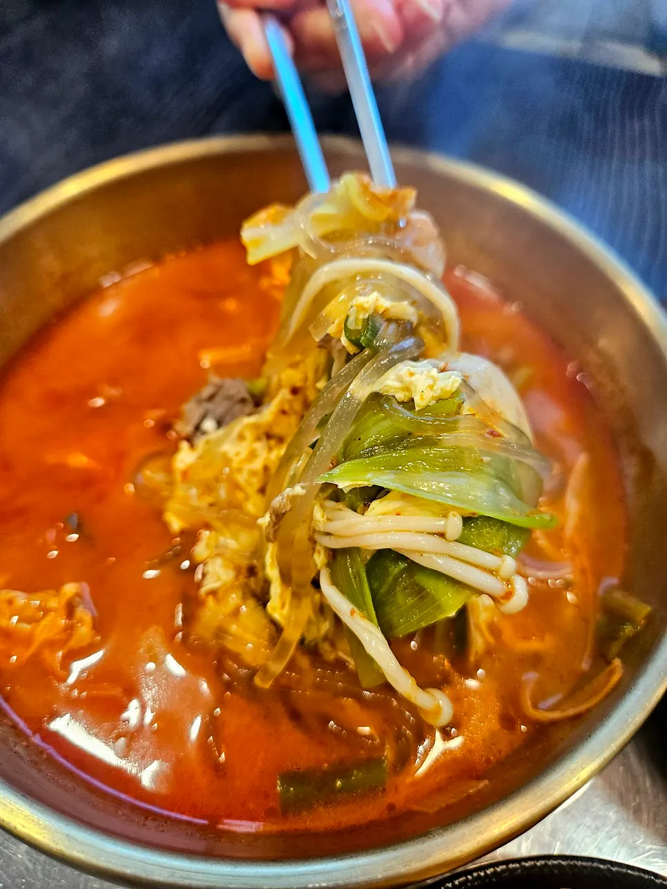 Spicy seolleongtang loaded with glass noodles