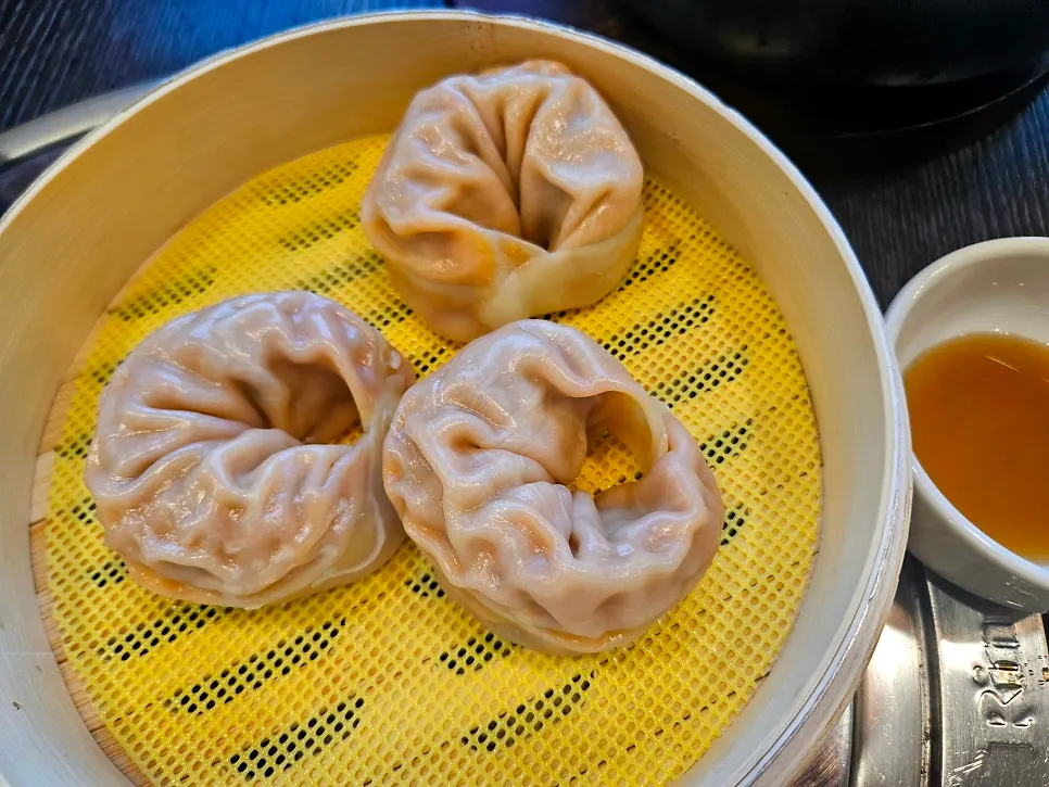 Kimchi mandu served on a plate