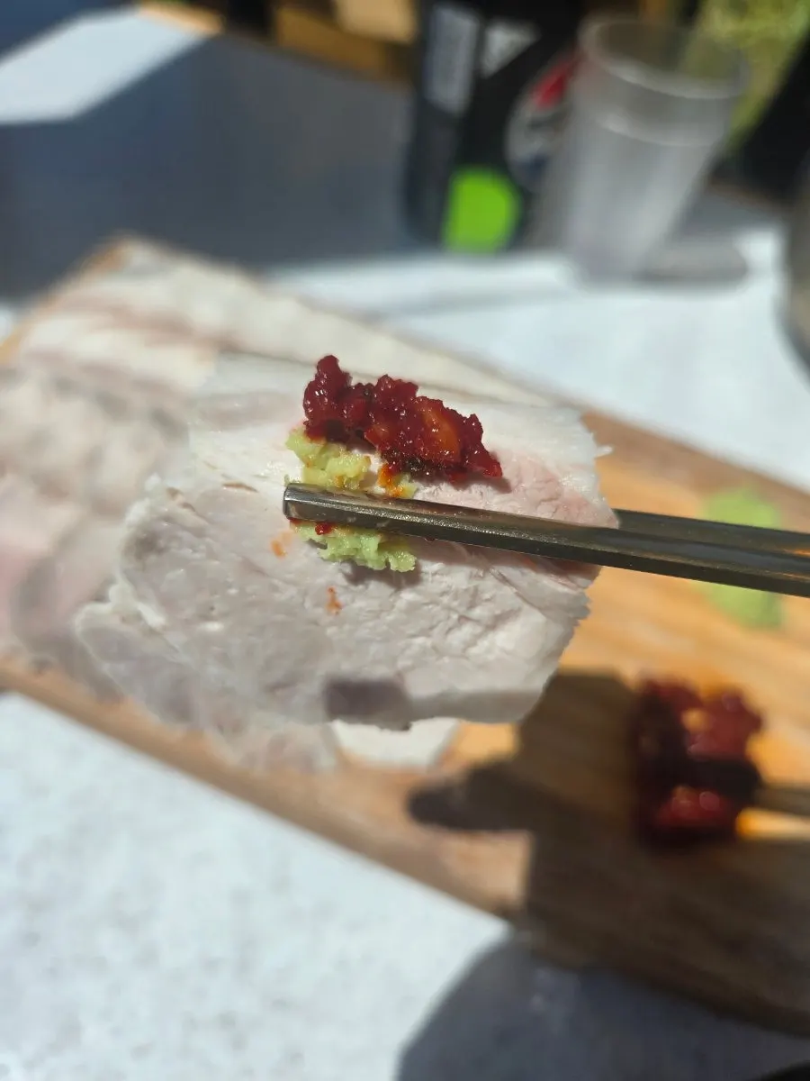 A plate of dombe naengsuyuk made with Jeju pork