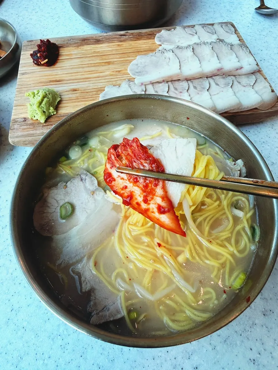 Bone broth pork noodles piled high with meat