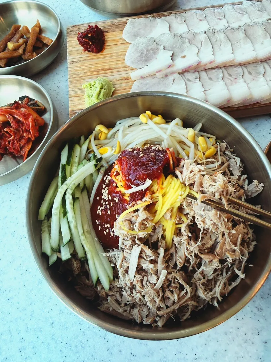 Close-up of the toppings on the dongchimi bibim noodles