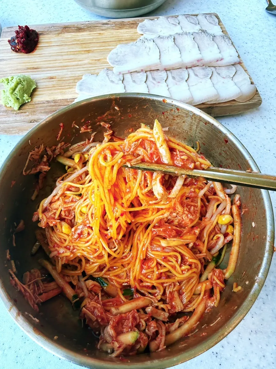A bowl of tangy-sweet dongchimi bibim noodles