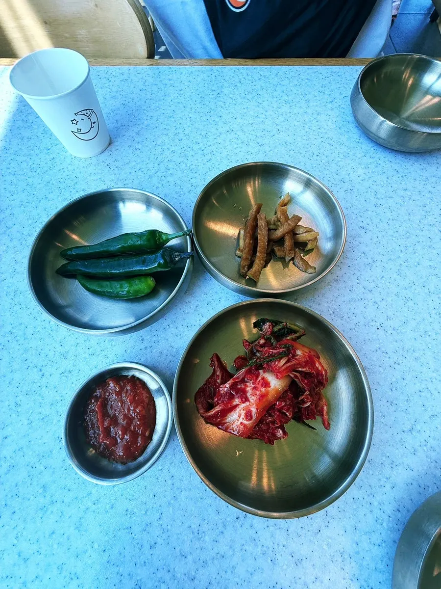 Handam Guksu's self-serve side dish counter